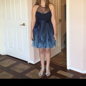 Dark blue high neck dress.